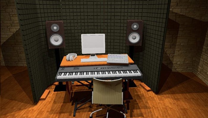 Akustik grid panellerle kaplanmış ev kayıt stüdyosunda çalışma masası, monitörler ve klavye