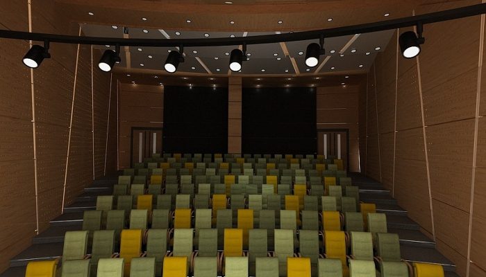 Renkli koltuklu oditoryumda ahşap akustik panel uygulaması