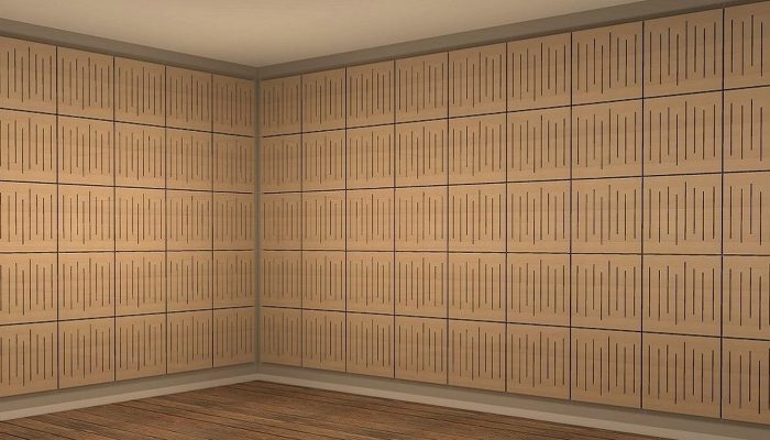 Delikli ahşap akustik panellerle tümüyle kaplı oda köşesi