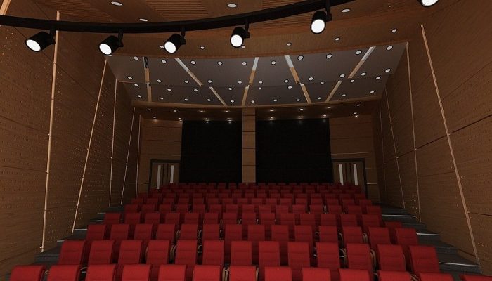 Ahşap akustik panellerle kaplı sinema salonu