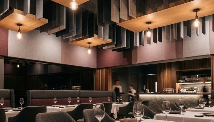 Elit Acoustic restoran ve kafe akustiği: tavan baffle, kanopi ve kumaş kaplı duvar paneli çözümleri